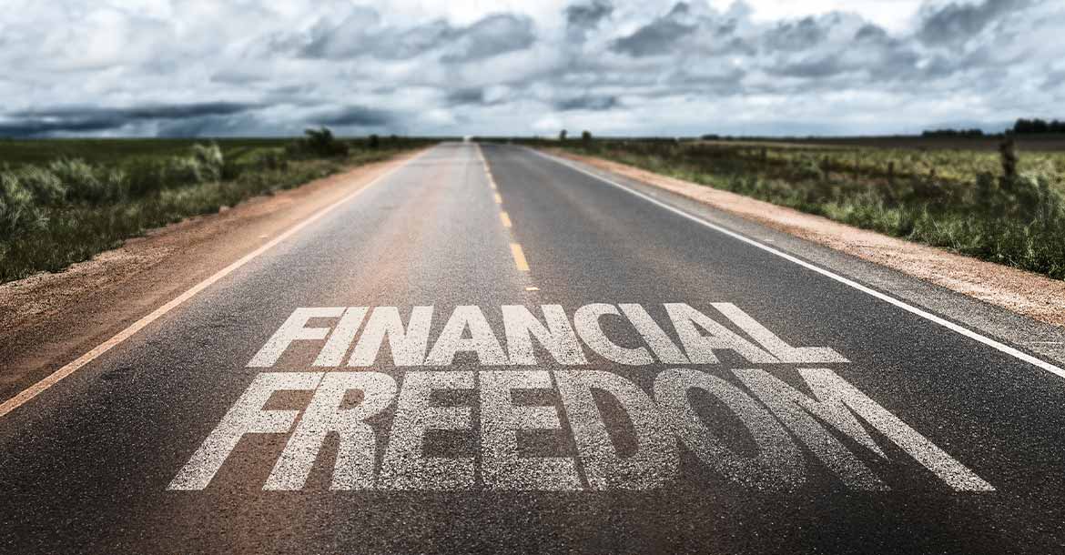 financial freedom sign on road
